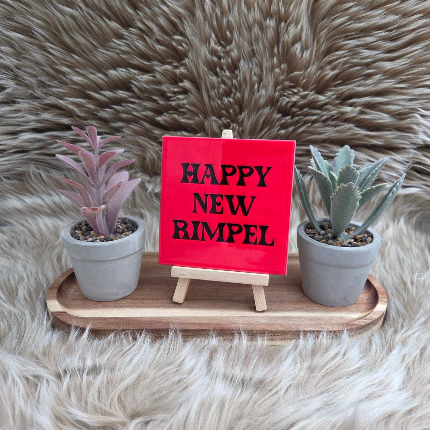 Spreuktegel met tekst Happy new rimpel
