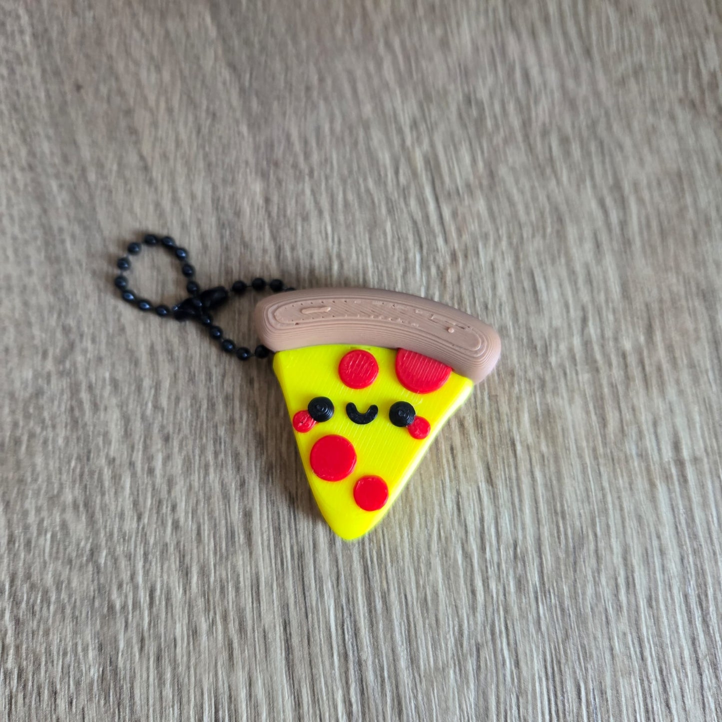Sleutelhanger vrolijke pizzapunt