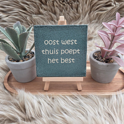 Robuust wenstegeltje:  oost west thuis poept het best