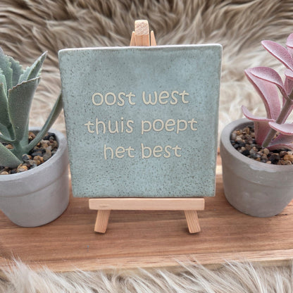 Robuust wenstegeltje:  oost west thuis poept het best