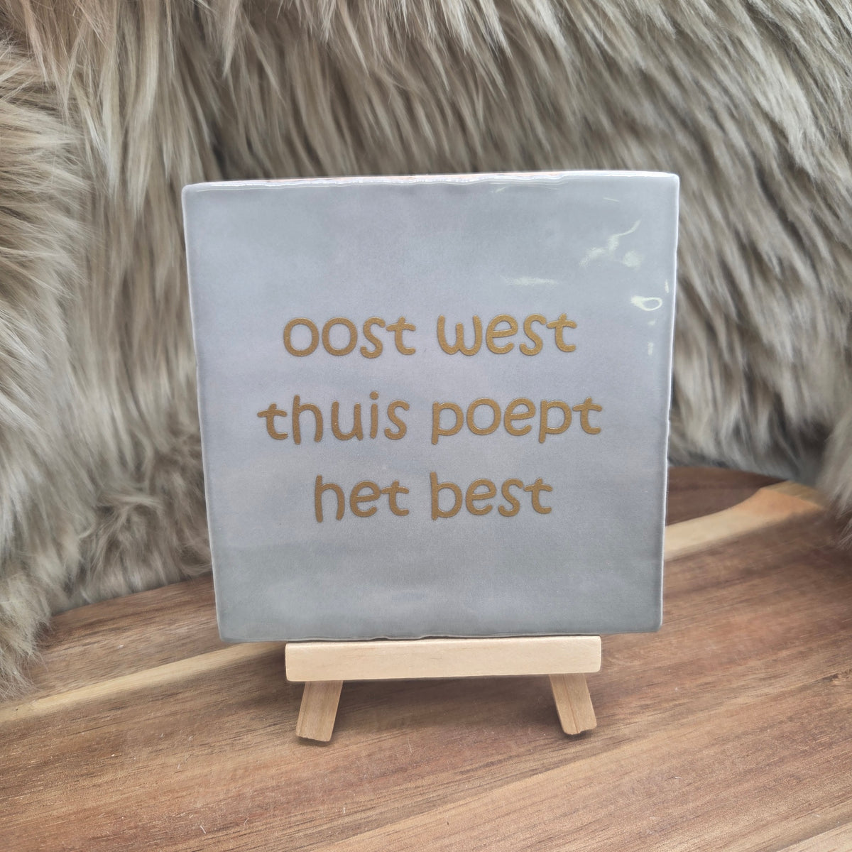 Robuust wenstegeltje:  oost west thuis poept het best