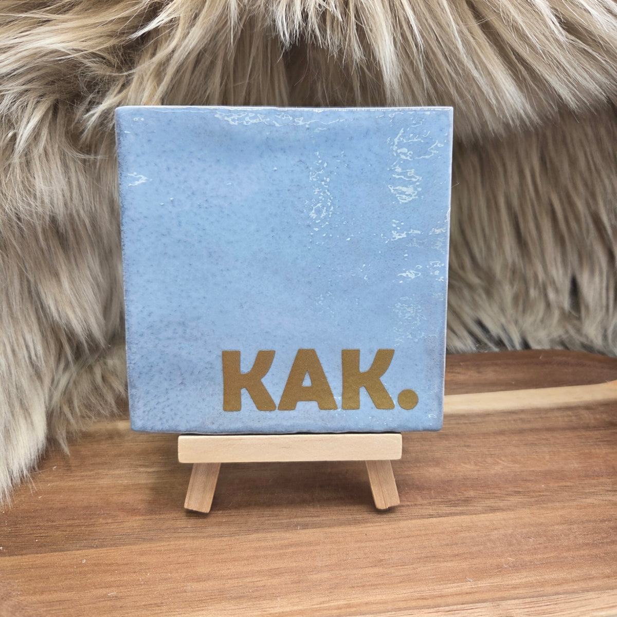 Robuust wenstegeltje: KAK.