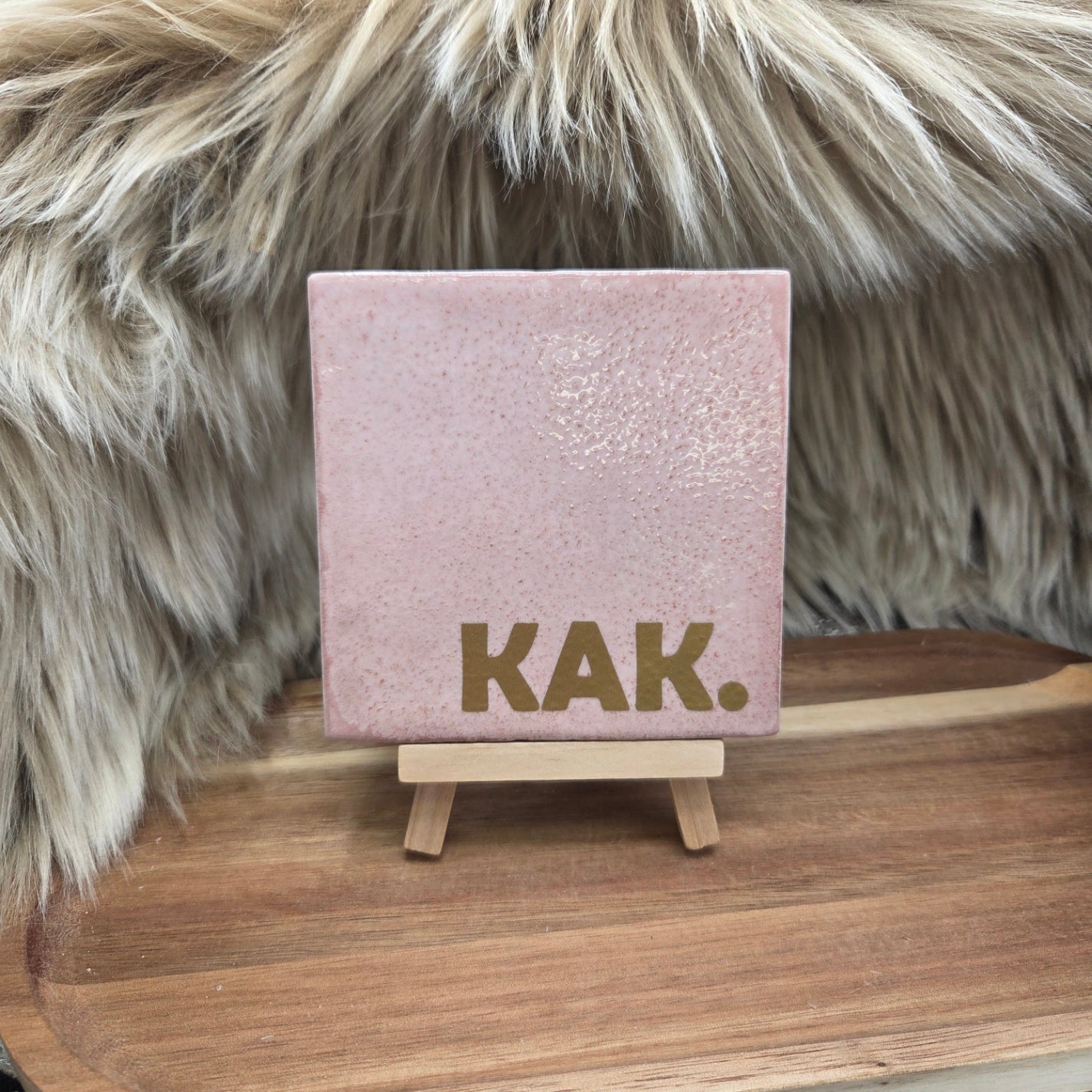 Robuust wenstegeltje: KAK.
