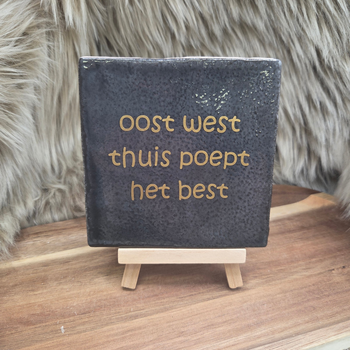 Robuust wenstegeltje:  oost west thuis poept het best