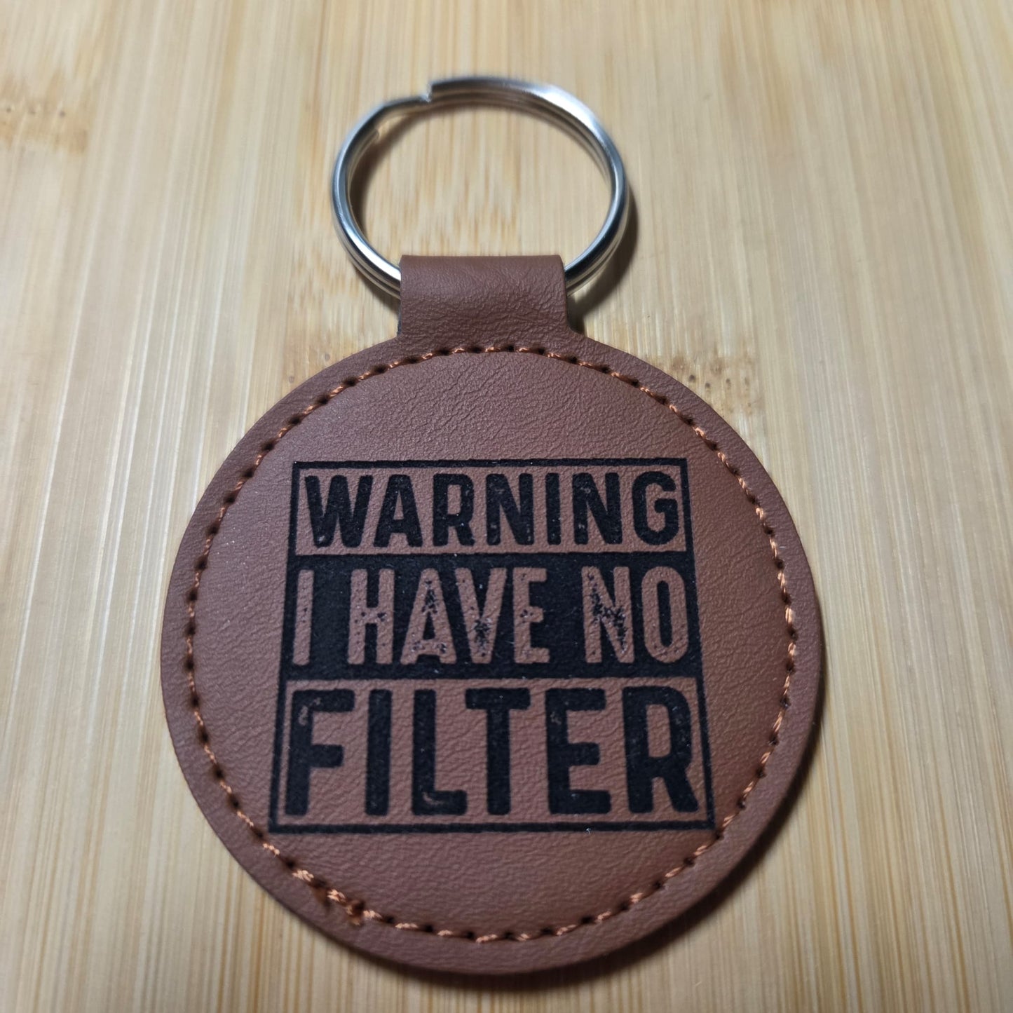 Leren sleutelhanger: Warning I have no filter